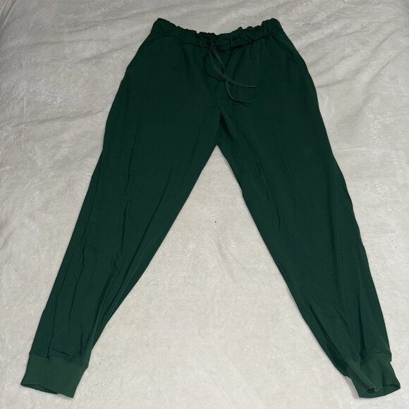 Women’s Lululemon On The Fly Green Joggger Pants Size 10 - Picture 1 of 7